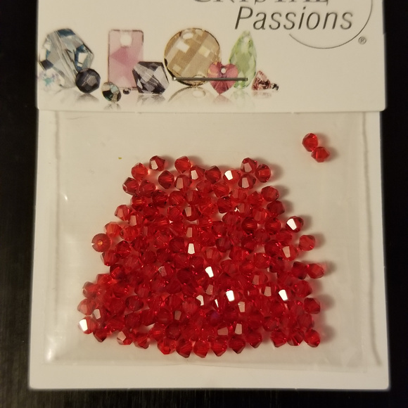 Swarovski Jewelry - 4/$75 Swarovski 3mm Bi-cone Lt Siam Xilion Crystal